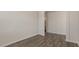 Neutral interior shot of a room with hardwood-style floors at 132 Paper Birch Way, Fuquay Varina, NC 27526