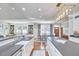 Spacious kitchen open to dining area, featuring a large island and lots of natural light at 1400 Oakland Ave, Durham, NC 27705