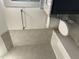Modern bathroom with sleek fixtures, neutral tile, and a combo tub and shower at 143 Prency Ln, Middlesex, NC 27557
