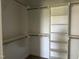 Walk-in closet with custom shelving and racks at 143 Prency Ln, Middlesex, NC 27557