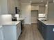 Modern kitchen with stainless steel appliances, stylish cabinets, and granite countertops at 143 Prency Ln, Middlesex, NC 27557