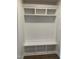 Hall tree style mudroom with bench and overhead storage at 143 Prency Ln, Middlesex, NC 27557