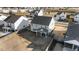 Areal view of a home with an enclosed porch and spacious backyard in a residential neighborhood at 158 Arlie Ln, Lillington, NC 27546