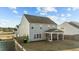 Well-maintained home featuring a screened-in porch and a fenced backyard at 158 Arlie Ln, Lillington, NC 27546