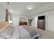 Spacious main bedroom featuring neutral walls, carpet flooring, and two dressers at 158 Arlie Ln, Lillington, NC 27546