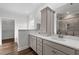 Bathroom with double vanity, quartz countertop, and walk-in shower at 170 Dunvegan Ln, Burlington, NC 27215