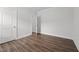 An inviting bedroom with luxury vinyl plank flooring and white trim for a cozy and stylish ambiance at 170 Dunvegan Ln, Burlington, NC 27215