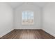 Bright bedroom features high ceilings and a large arched window at 170 Dunvegan Ln, Burlington, NC 27215
