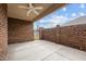 Covered brick patio with concrete floor and a metal gate provides a secure and stylish outdoor space at 170 Dunvegan Ln, Burlington, NC 27215