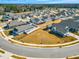 Bird's eye view of a planned community with tidy landscaping and curved streets at 1727 Pinecliff Ct, Fuquay Varina, NC 27526