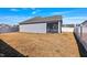 Spacious backyard with a covered porch, lawn, and privacy fence at 1727 Pinecliff Ct, Fuquay Varina, NC 27526