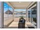 Relaxing screened porch with wicker furniture and views of the backyard at 1727 Pinecliff Ct, Fuquay Varina, NC 27526