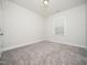 Bedroom with neutral carpet, and a window with blinds at 1981 Rosedale Ridge Ave, Wake Forest, NC 27587