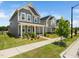 Beautiful two-story house featuring a covered porch and well-maintained lawn at 1981 Rosedale Ridge Ave, Wake Forest, NC 27587