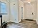 Inviting foyer featuring hardwood floors, neutral walls, and a well-lit entry at 1981 Rosedale Ridge Ave, Wake Forest, NC 27587