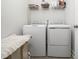 Laundry room featuring a washer and dryer, and shelving at 1981 Rosedale Ridge Ave, Wake Forest, NC 27587