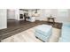 Open floor plan showcasing a kitchen, dining area, and living room, perfect for entertaining at 1981 Rosedale Ridge Ave, Wake Forest, NC 27587