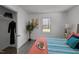 Bright bedroom with plenty of natural light, closet space, and comfortable bedding at 202 Harper Rd, Hillsborough, NC 27278