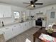 Updated kitchen featuring white cabinets, stainless steel appliances, and modern fixtures at 202 Harper Rd, Hillsborough, NC 27278