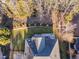 Backyard featuring a spacious deck, well-maintained lawn and lush landscaping, perfect for outdoor entertaining and relaxation at 2110 Crigan Bluff Dr, Cary, NC 27513