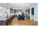 Well-appointed kitchen with a central island, modern lighting and stainless appliances at 2110 Crigan Bluff Dr, Cary, NC 27513