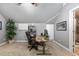 Comfortable home office with a custom desk and an attached full bathroom at 2110 Crigan Bluff Dr, Cary, NC 27513