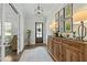 Inviting foyer with hardwood floors and elegant decor at 2111 Meadowcreek Dr, Durham, NC 27705