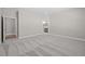 A large main bedroom with neutral carpet and an en-suite bathroom at 2321 Calluna Ct, Fuquay Varina, NC 27526