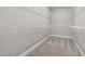 Walk-in closet with wire shelving and neutral carpet at 2321 Calluna Ct, Fuquay Varina, NC 27526