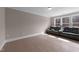 Comfortable bonus room with a large window and reclining seating at 2609 Aster Ct, Apex, NC 27502
