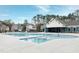 Modern community pool and clubhouse offer residents a place to relax and socialize at 2609 Aster Ct, Apex, NC 27502
