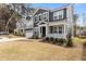 Charming two-story home with a covered front porch and a two-car garage at 2609 Aster Ct, Apex, NC 27502