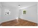 Bright bedroom with hardwood floors, fresh paint, and natural light at 2611 Atlantic St, Durham, NC 27707