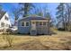 Charming blue home with a quaint front porch and well-maintained landscaping at 2611 Atlantic St, Durham, NC 27707