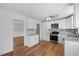 Bright kitchen features stainless steel appliances, granite countertops, and hardwood flooring at 2611 Atlantic St, Durham, NC 27707