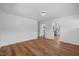 Open-concept living room showcases hardwood floors and plenty of natural light at 2611 Atlantic St, Durham, NC 27707