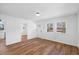 Bright living room featuring hardwood floors, fresh paint, and natural light at 2611 Atlantic St, Durham, NC 27707