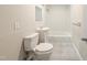 Bathroom featuring a toilet, vanity, sink, mirror and a shower-tub combo at 2918 Avalon Rd, Rocky Mount, NC 27801