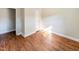 Bedroom with wood floors, crisp trim and large windows at 2918 Avalon Rd, Rocky Mount, NC 27801