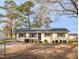 Charming single-story home with mature trees and a well-maintained front yard at 2918 Avalon Rd, Rocky Mount, NC 27801