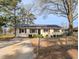Charming single-story home with mature trees and a well-maintained front yard at 2918 Avalon Rd, Rocky Mount, NC 27801