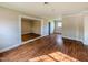 Spacious living room featuring gleaming hardwood floors and neutral paint, creating a bright and inviting atmosphere at 2918 Avalon Rd, Rocky Mount, NC 27801