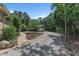 Long driveway leading up to the main house and a detached two-car garage at 295 Cedar Rock Trl, Fuquay Varina, NC 27526