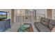 Loft living room with a cozy couch and an accent table with plants at 295 Cedar Rock Trl, Fuquay Varina, NC 27526