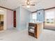 Bedroom area shows blue walls, a closet with white sliding doors and a vintage-style gas heater at 298 E Salisbury St, Pittsboro, NC 27312