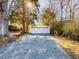 Spacious detached garage with a double door, providing ample parking and storage at 298 E Salisbury St, Pittsboro, NC 27312