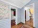 Hallway view into a half bath and another room at 298 E Salisbury St, Pittsboro, NC 27312