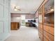 Comfortable office space with carpet, built-in storage, and natural light from a window at 298 E Salisbury St, Pittsboro, NC 27312