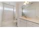 Cozy bathroom design showcasing a tub, marble countertops, and classic fixtures at 302 Edinburgh Dr, Cary, NC 27511