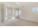 Spacious bedroom with multiple windows, neutral paint, and cozy carpeting at 302 Edinburgh Dr, Cary, NC 27511